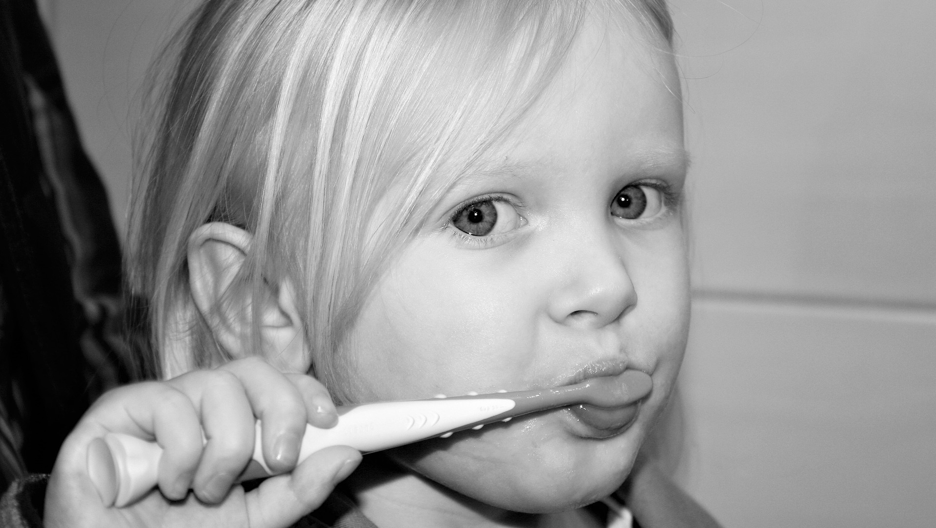 Child brushing teeth