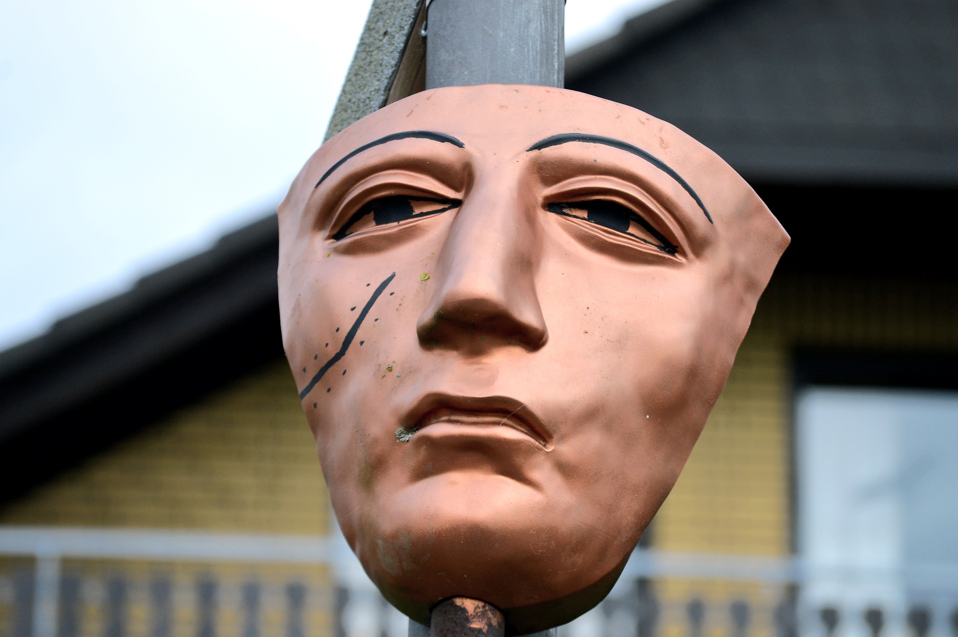 Face mask with a painted scar