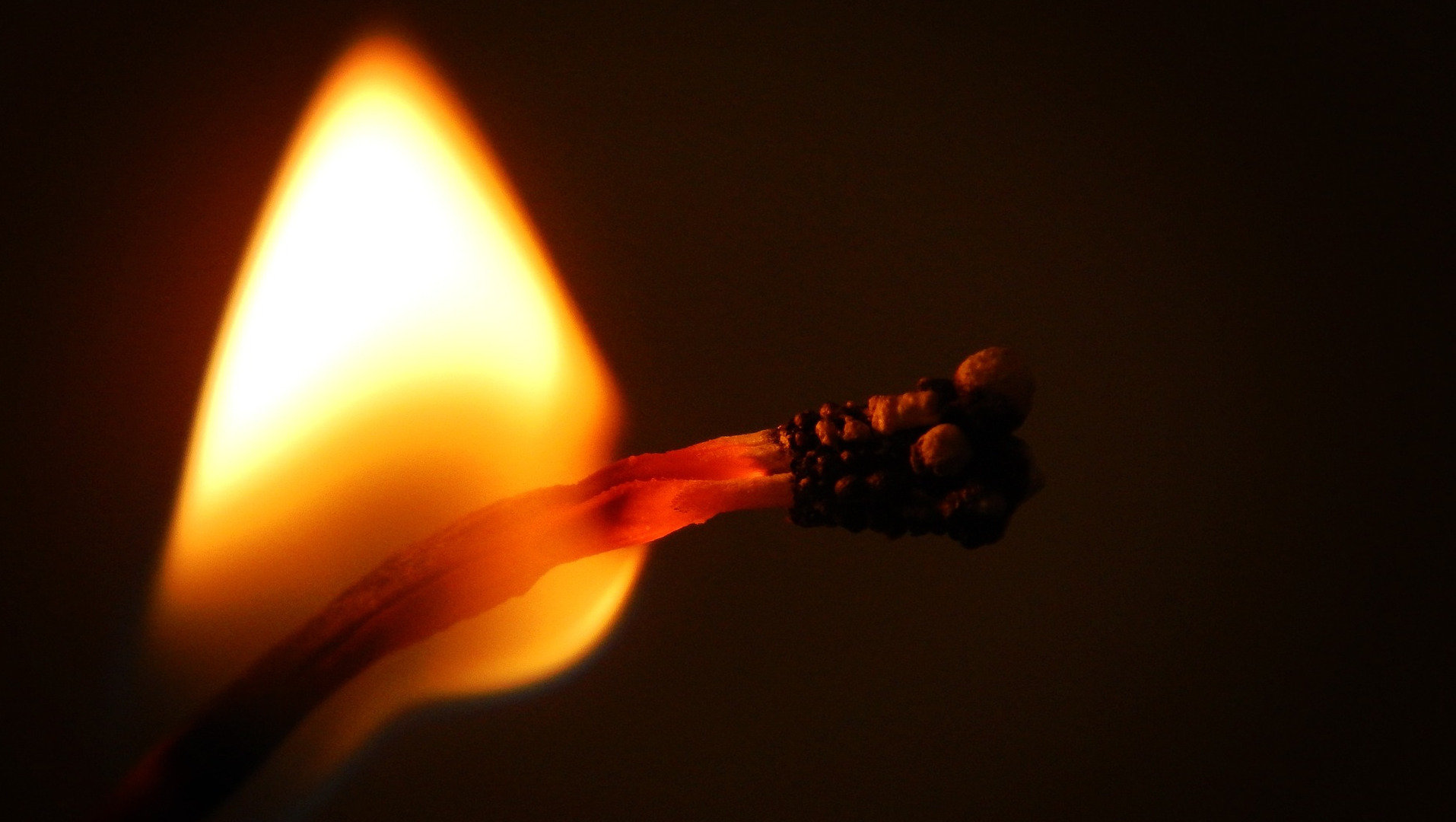 Lit match containing phosphorus